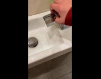 Woman shows waterfall faucet