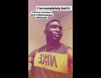 Nike shirt guy tries not to smile