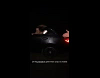 Passing a phone between two moving cars