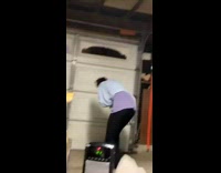 Girl slaps girl with slice of pizza