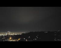 Guy on hill sees fire black smoke