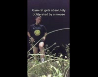 Guy approaches rat and it jumps at him 