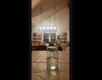 Guy throws orange ball glass cup kitchen 