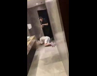 Guy spins around in restroom drunk guy vomits on him