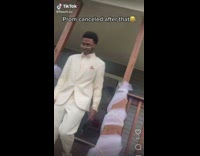 Guy in prom suit slips and falls when he poses for camera
