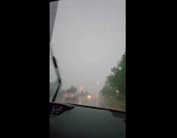 Lightning strike near the car of filmer