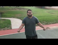 Guy with big boobs get his boobs slapped to the beat of Two door cinema club song at basketball court