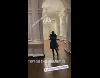 man walks through white doors indoor