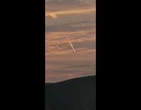Meteorite trail seen on the sunset sky