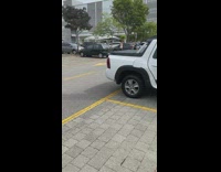 Collab IITW - Man orange tank top raise plant parking lot