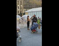 Friend films guy handing object to girl 