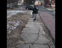 Guy talks on the phone, gets kidnapped by kidnappers in black ski mask, trash bag on head, thrown in trunk