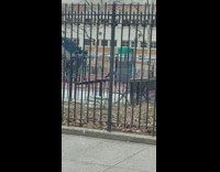 Person lays down while on swings 