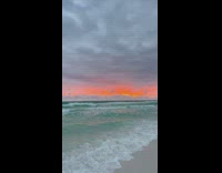 Orange sky sunset beach water 