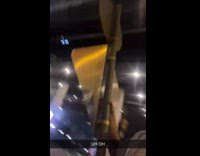 Man Holds Up Street Sign and Gets Caught