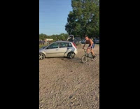 Guy does backflip on bicycle into water