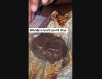 Burnt Wendy's burger with steam and mushy inside