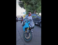 Lady Lifts and Turns Around Big Bike