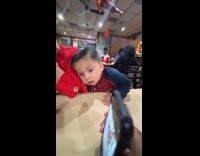 Boy loves to gossip stares at phone