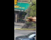 Smoke and flame come out from manhole