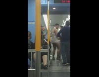 Man wears small short white dress and gets applause on subway train 