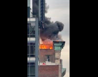 Collab winy - Building rooftop balcony in SoHo on fire