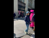 Collab winy - Man pink fur hat and coat walk street