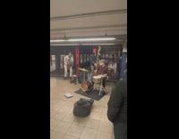 Jazz band performs at train station 