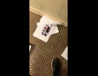 Students stuff napkin dispenser with Bobby Shmurda school walkout poster signs and falls on ground