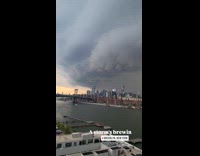 Submitter shows dark clouds over manhattan skyline