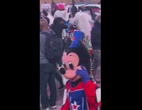 Crowded times square mickey mouse costume helmet