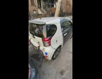 Small car has action figures on it 