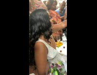 Couple has fancy dinner with folding chairs and pop up table on the subway train