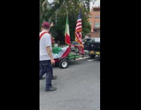 Street parade with saint being showcased 