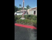 Black shirt guy brown garage auto shop 