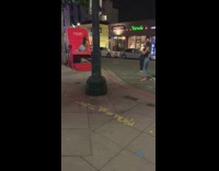 Woman brown top sit big red chair