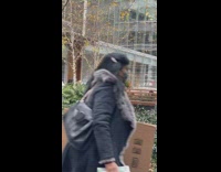 Fred Flinstone sits on bench