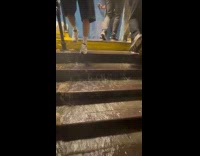 Rain pours down the stairs like waterfalls