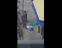 Guy white shirt push up in sidewalk