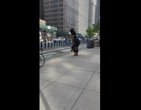 Guy sings in inflatable costume 