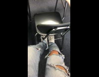 Guy salmon colored hoodie sitting on table in class clown makeup