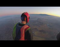 Guys go skydiving from hot air balloon