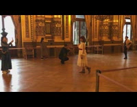 Tourists take pictures inside opera house