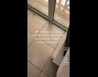 Guy drops eraser during exam to tell answer