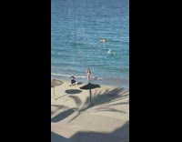 Girl bikini beach bald cameraman hut umbrella part 2