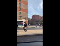 Random woman dances in middle of road