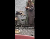 Woman brown coat stand food photo shoot