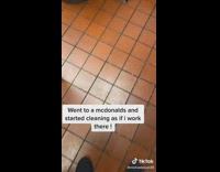 Guy works inside of mcdonalds with old uniform 