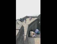 Woman dances by view