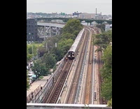Railway repair by employee at train tracks